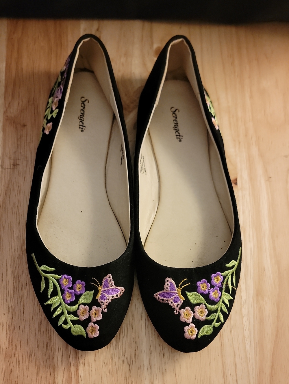 Serengeti Women's Black Embroidered Ballet Flats with Purple Floral Detail